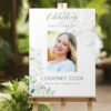 Funeral sign board printed with white roses and photo